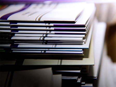 Large format printed sheets stacked